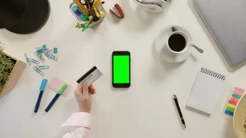 A Finger Touching a Smartphone with a Green Screen Stock Footage 86090811