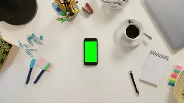 A Finger Touching a Smartphone with a Green Screen Stock Footage 86090865