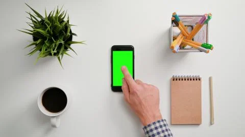 A Finger Touching a Smartphone Stock Photos