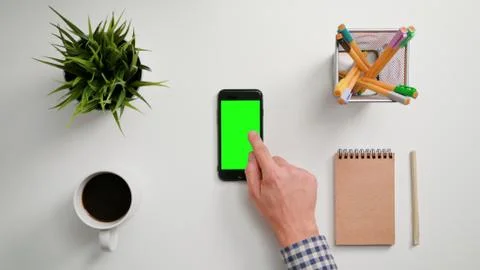 A Finger Touching a Smartphone Stock Photos