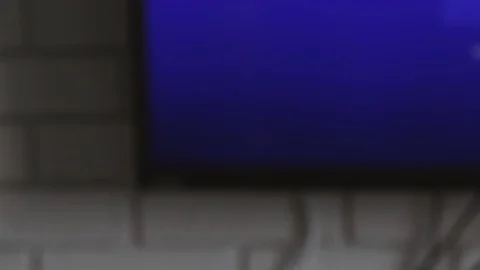 Finger turns off the TV with a button on the remote control Stock Footage 108591457