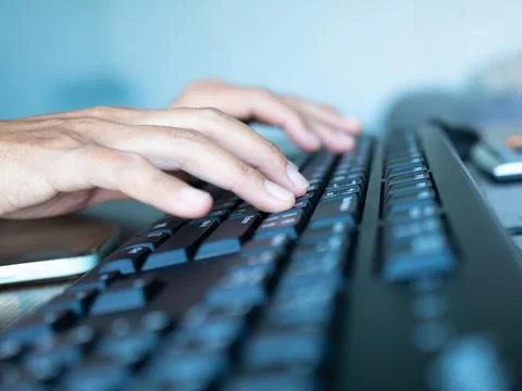 Finger Typing on Keyboard Computer Pc with Light Dark, Hacker Cyber input Stock-Fotos