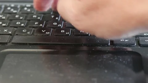 Finger typing on a laptop keyboard Stock Footage 213646791