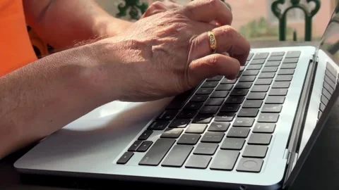 Finger typing on laptop keyboard Stock Footage 325949656