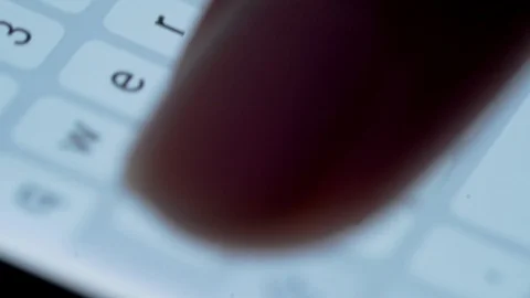 Finger typing on mobile phone screen texting and writing message Stock Footage 115689706