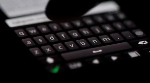 Finger Typing on smartphone in the dark, Close up Stock Footage 35331359
