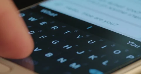Finger typing on smartphone keyboard Stock Footage 67487309