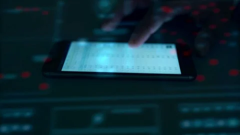 The finger work with a smartphone on the background of a virtual screen Stock Footage 76261053