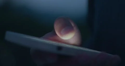 Finger of young man actively touching scroll pages app on smartphone and browse Stock Footage 228898240
