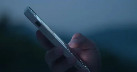 Finger of young man scroll page app on mobile phone and Browse Social Network Stock-Footage 228896691