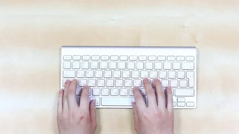 Fingerboard. Top view, Female hands type text on the keyboard Stock Footage 74898259