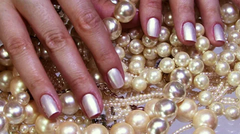 Fingernails and pearls Stock Footage 33311576