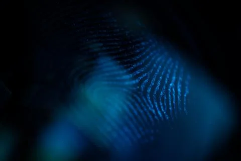 Fingerprint in the dark Stock Photos