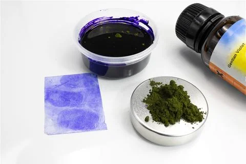 Fingerprint developer used by the csi, a bottle with gentian violet Stock Photos