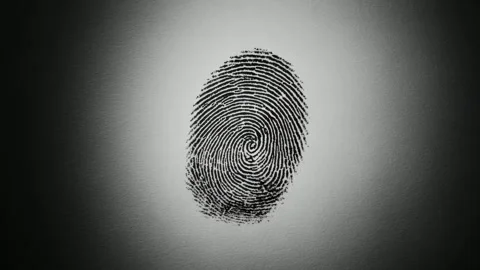 Fingerprint mark on textured paper background, black and white stop motion .. Video stock 342041143
