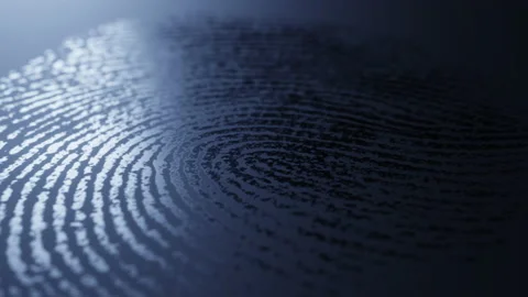 Fingerprint is revealed on dark surface Stock Footage 151688631