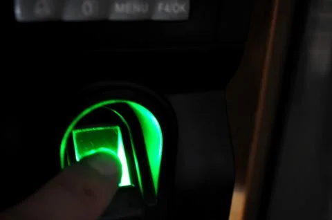 Fingerprint scanner to record working time 스톡 사진