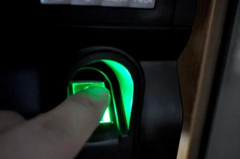 Fingerprint scanner to record working time Stock Photos