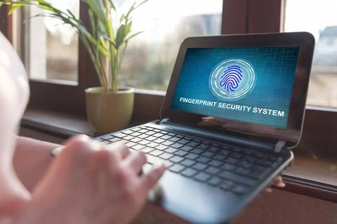 Fingerprint security system concept on a laptop screen 写真素材