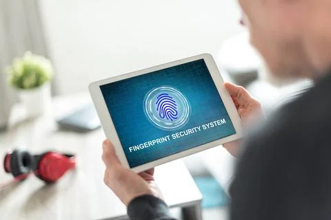 Fingerprint security system concept on a tablet 写真素材