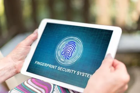 Fingerprint security system concept on a tablet Stock Photos