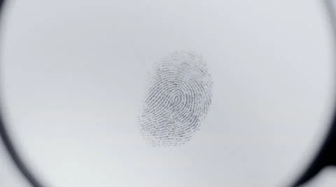 Fingerprint under magnifier Vidéo 20502355