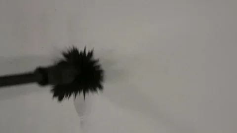 Fingerprints, magnetic powder applicator develops latent print on white paper 動画素材 83959383
