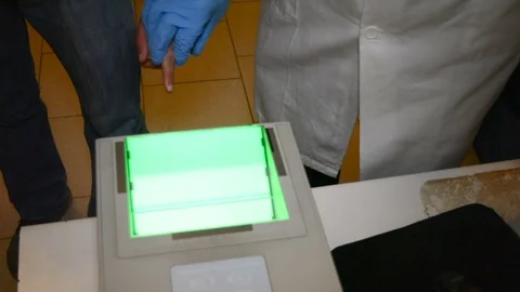 Fingerprints, taking fingerprints on scanner for identification Stock Footage 83967064