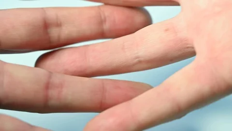 Fingers of agitated hands intertwining Stock Footage 126349594