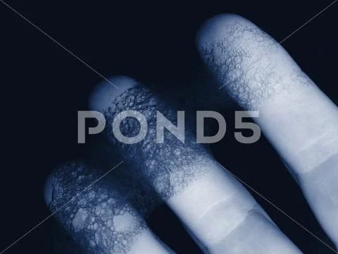 Fingers and soap bubbles Stock Photos