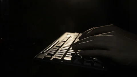 Fingers on a black keyboard backlit Stock-Footage 88760914