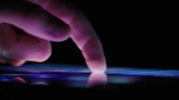 Fingers browsing online on tablet Stock Footage 85516230