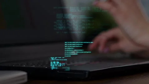 Fingers of a developer programmer typing computer code on a laptop keyboard Stock Footage 283729575