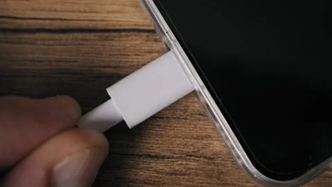 Fingers Disconnecting USB-C Cable From Phone Macro Stock Footage 320573524