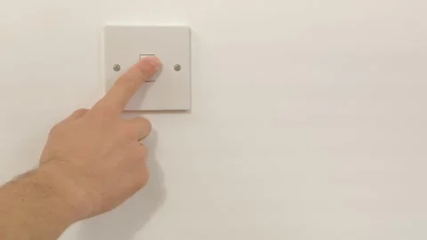 Fingers flipping switch, demonstrating electrical safety, electrical safety.. Stock Footage 308511085