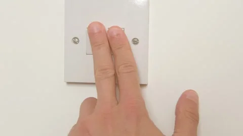 Fingers flipping switch, demonstrating electrical safety, electrical safety.. Stock Footage 335084955