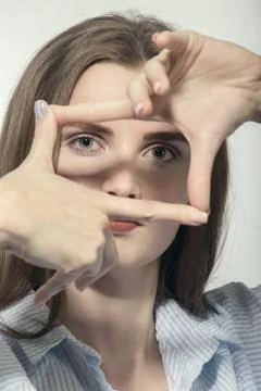 Fingers in frame Photos