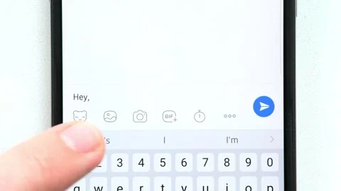 Fingers of hand write on screen of mobile phone message to interlocutor "Hey, wh Stock Footage 248028880