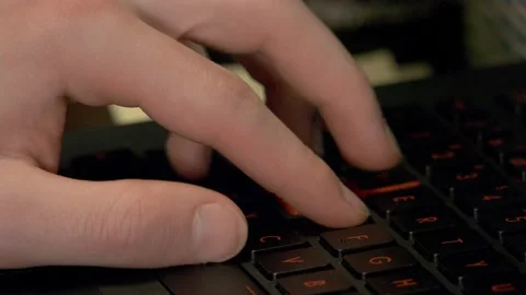 Fingers on keyboard in closeup Stock Footage 140477217