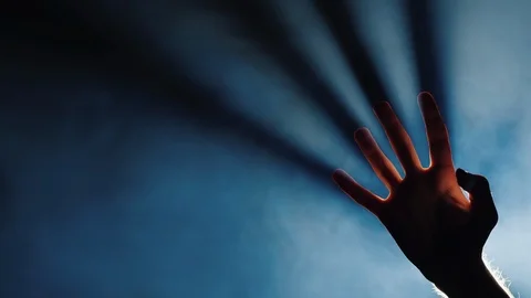 From the fingers of the man's hand come rays - a nightmare Stock Footage 123412030