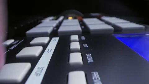 Fingers moving faders of the musical controller Stock Footage 150230347