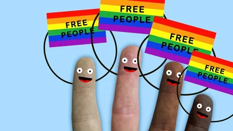 Fingers of one hand, of various ethnic groups manifest with rainbow flags Video stock 102046207