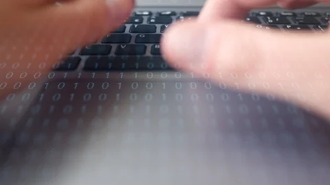 Fingers operate mousepad and type on laptop with digital binary code overlay Stock Footage 107243360