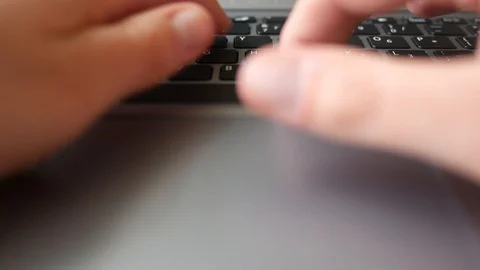 Fingers operate mousepad and type on laptop  Stock Footage 107243505