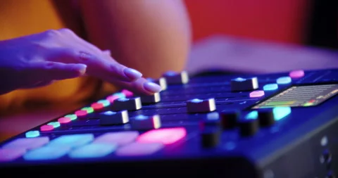 Fingers operating touchscreen on audio mixer with colorful backlight Stock Footage 315764659