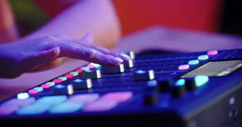 Fingers operating touchscreen on audio mixing console Stock Footage 315517678