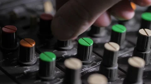 Fingers of operator adjusting sound on audio mixer Stock Footage 114994013