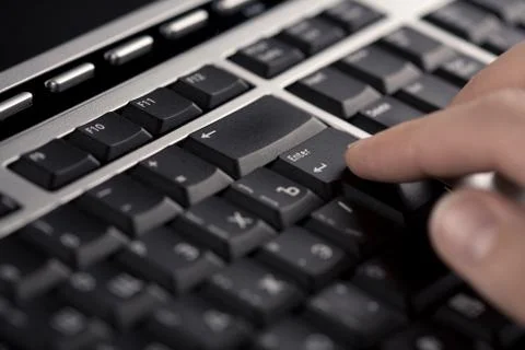 Fingers over computer keyboard Stock Photos