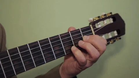 Fingers play classical guitar, close-up Stock Footage 72523600