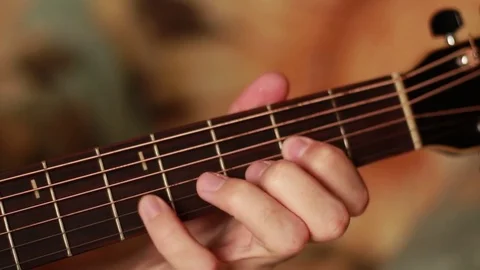 Fingers playing on the guitar's  neck 動画素材 72814427